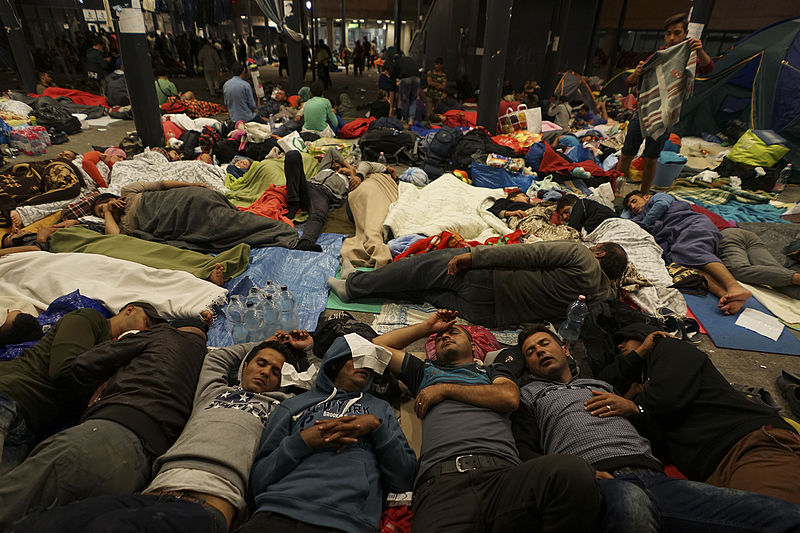 syrian_refugees_having_rest_at_the_floor_of_keleti_railway_station-_refugee_crisis-_budapest_hungary_central_europe_5_september_2015