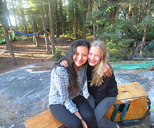 2 friends in summer camp hugging - John Austin Cheley Foundation