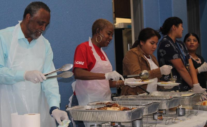 people volunteering at a kitchen