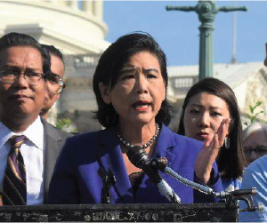 woman speaking in front of the White House