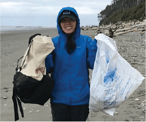Volunteer cleaning up the garbage from a national park - National Parks Conservation Association