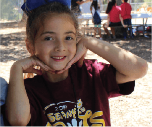 adorable girl at summer camp