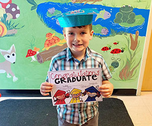 Little boy graduate Childrens Receiving Home Of Sacramento