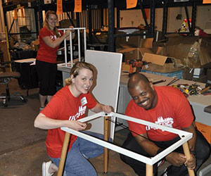 Volunteers doing some woodwork OneSource Center for Nonprofit Excellence