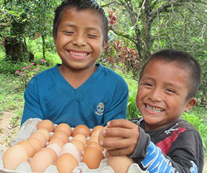 little boys happy to receive food Finding Freedom Through Friendship Inc