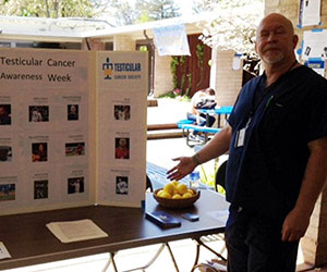 volunteer at their awareness booth Testicular Cancer Society