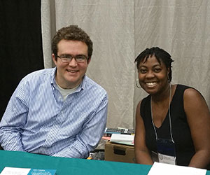 volunteers at their org booth Equal Justice USA Inc