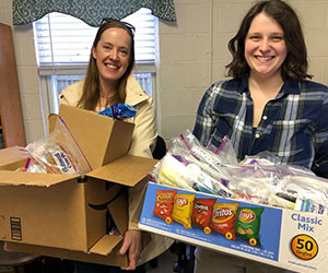 volunteers preparing donation boxes Lexington Rescue Mission Inc