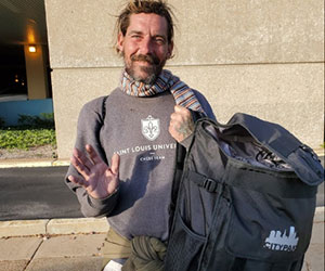 Homeless man received a backpack Back at You