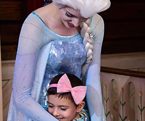 Little girl hugging Elsa Make-A-Wish Arizona