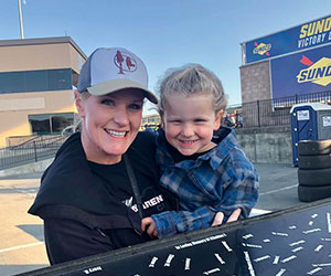 Mom and child at a racing for awareness event PMG Awareness Organization Inc.