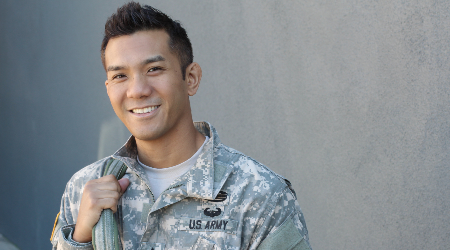 U.S. Army service man in uniform smiling