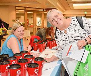 Volunteer and participant at seminar People Helping People Inc