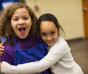 little girls hugging Boys _Girls Clubs of the Twin Cities