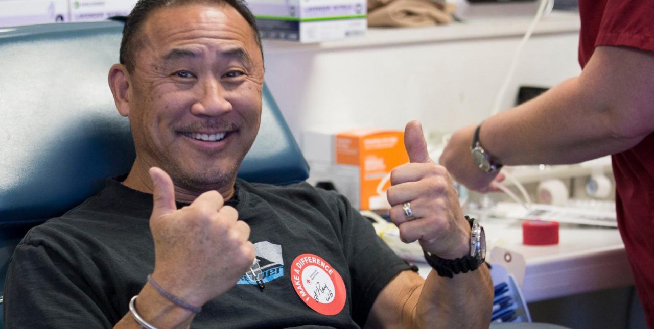 Person donates blood for American Red Cross